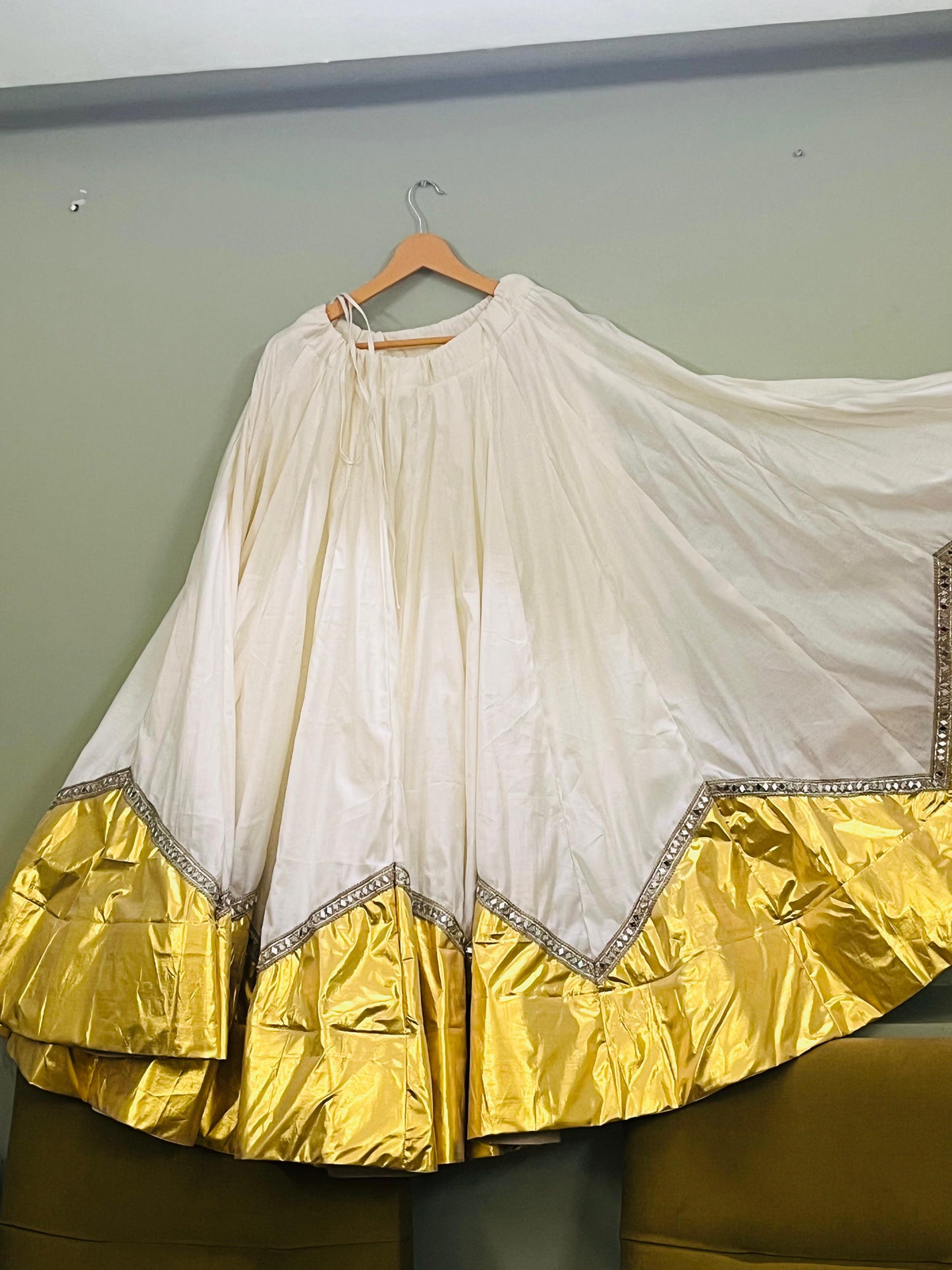 white lehenga (golden border)